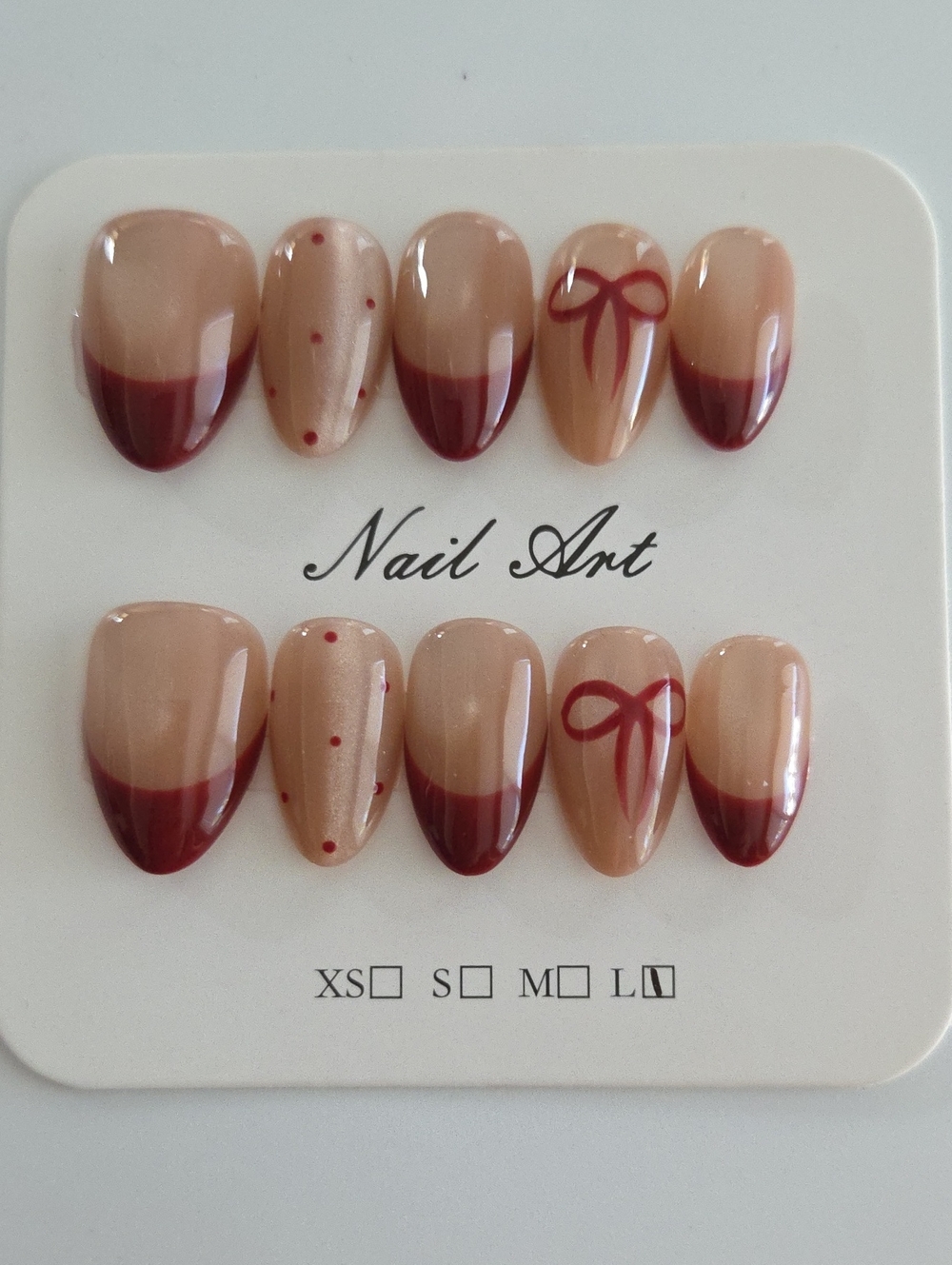 Nude and Deep Red Press-On Nail Set with Bow Accent